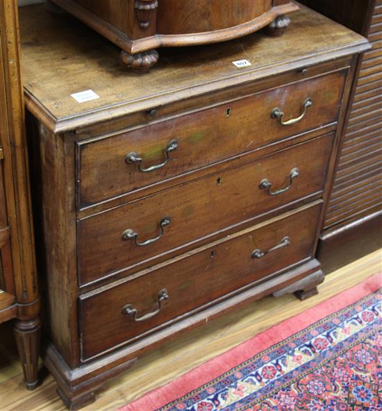A small George III style mahogany chest, fitted three small drawers and a brushing slide W.75cm